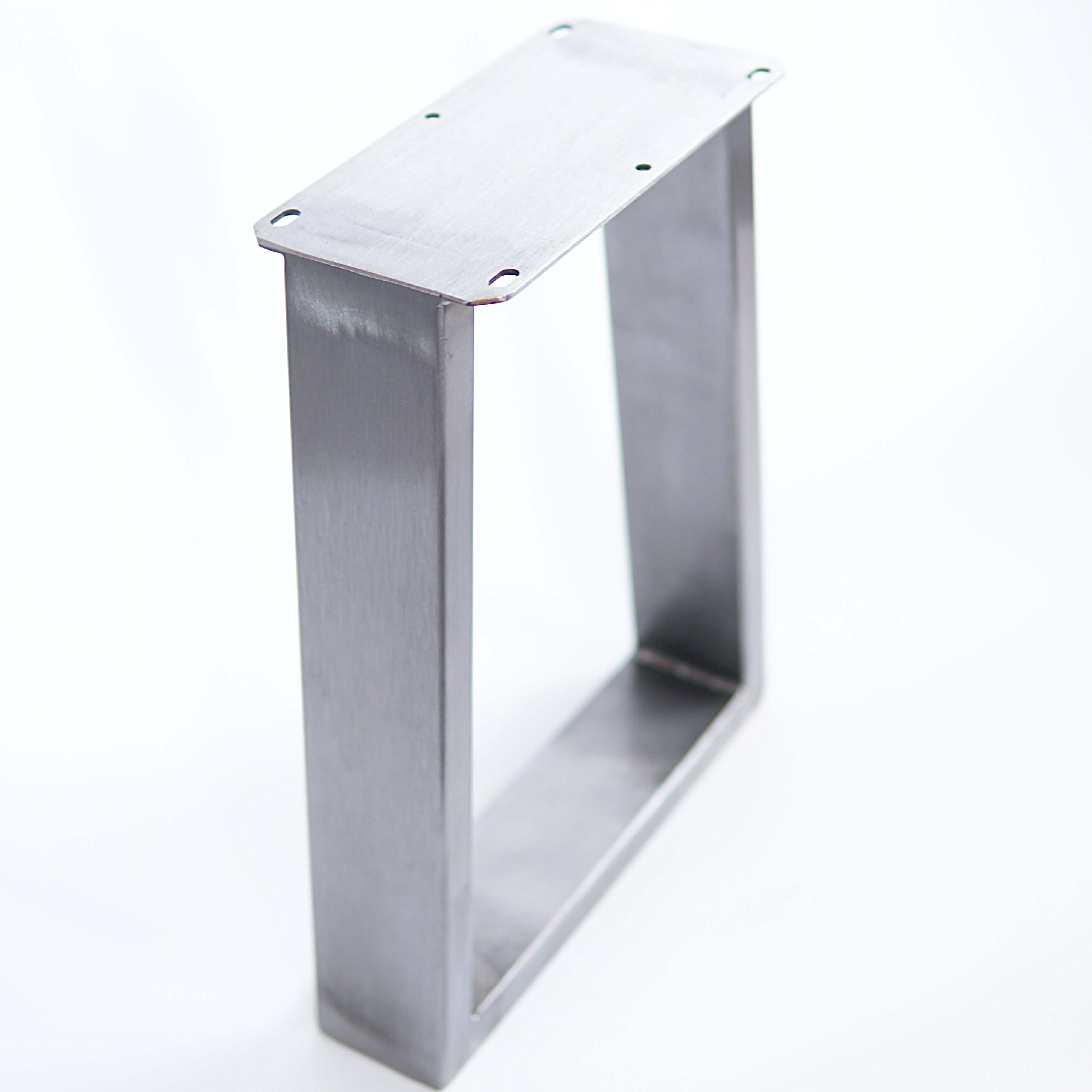 Silver trapezoid bench leg frame with mounting holes and open base