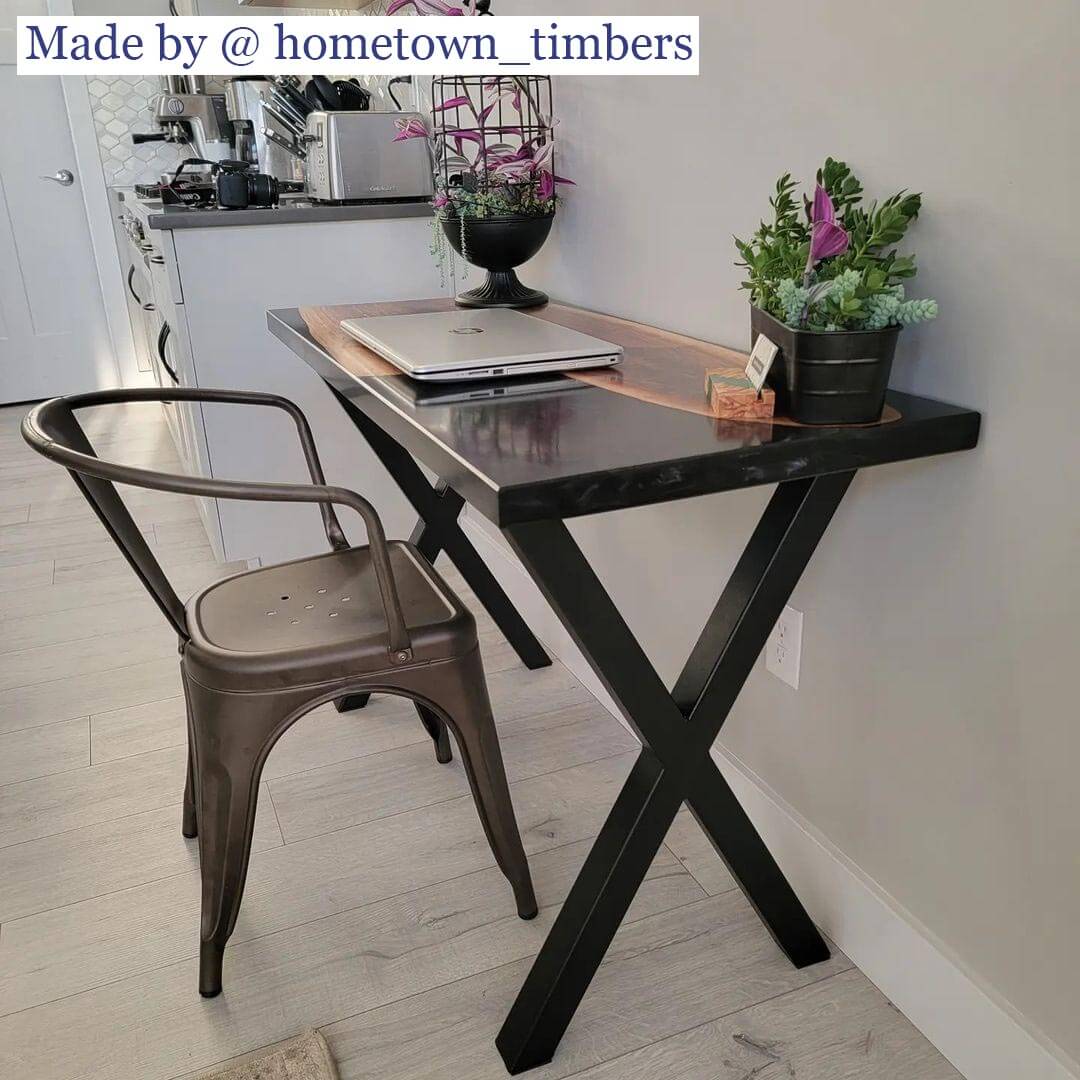Matte black writing desk table with X-frame legs and top