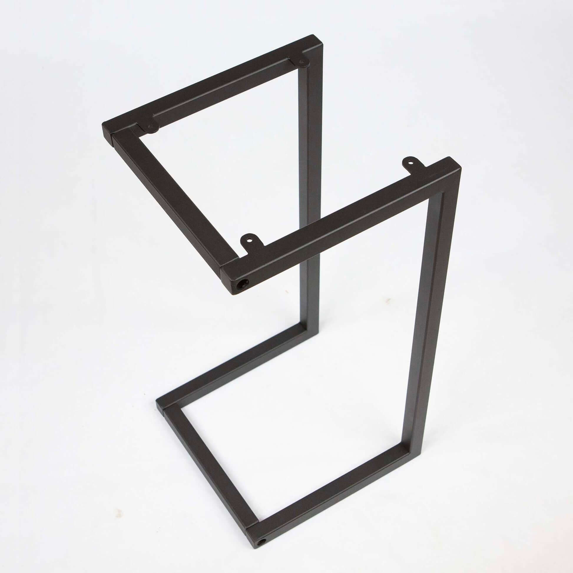 Square top C-shape side table base with sleek, modern design, featuring a sturdy metal frame in a minimalist style.