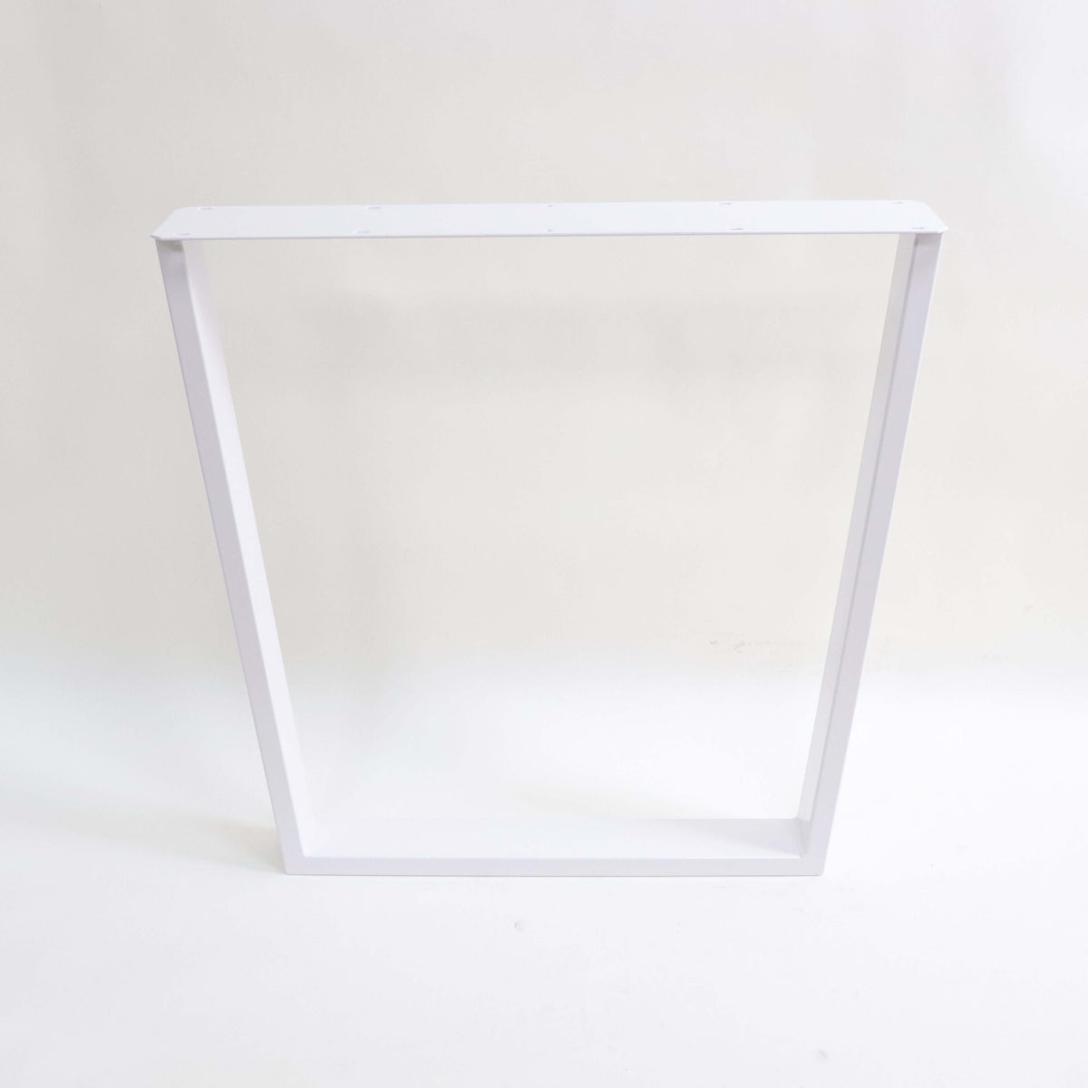 White trapezoid dining table leg frame with wide top, straight vertical supports