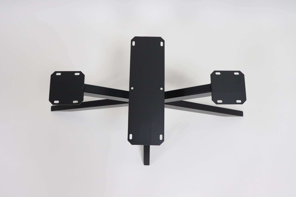 Black metal spider table base with four arm legs and top mounting plate