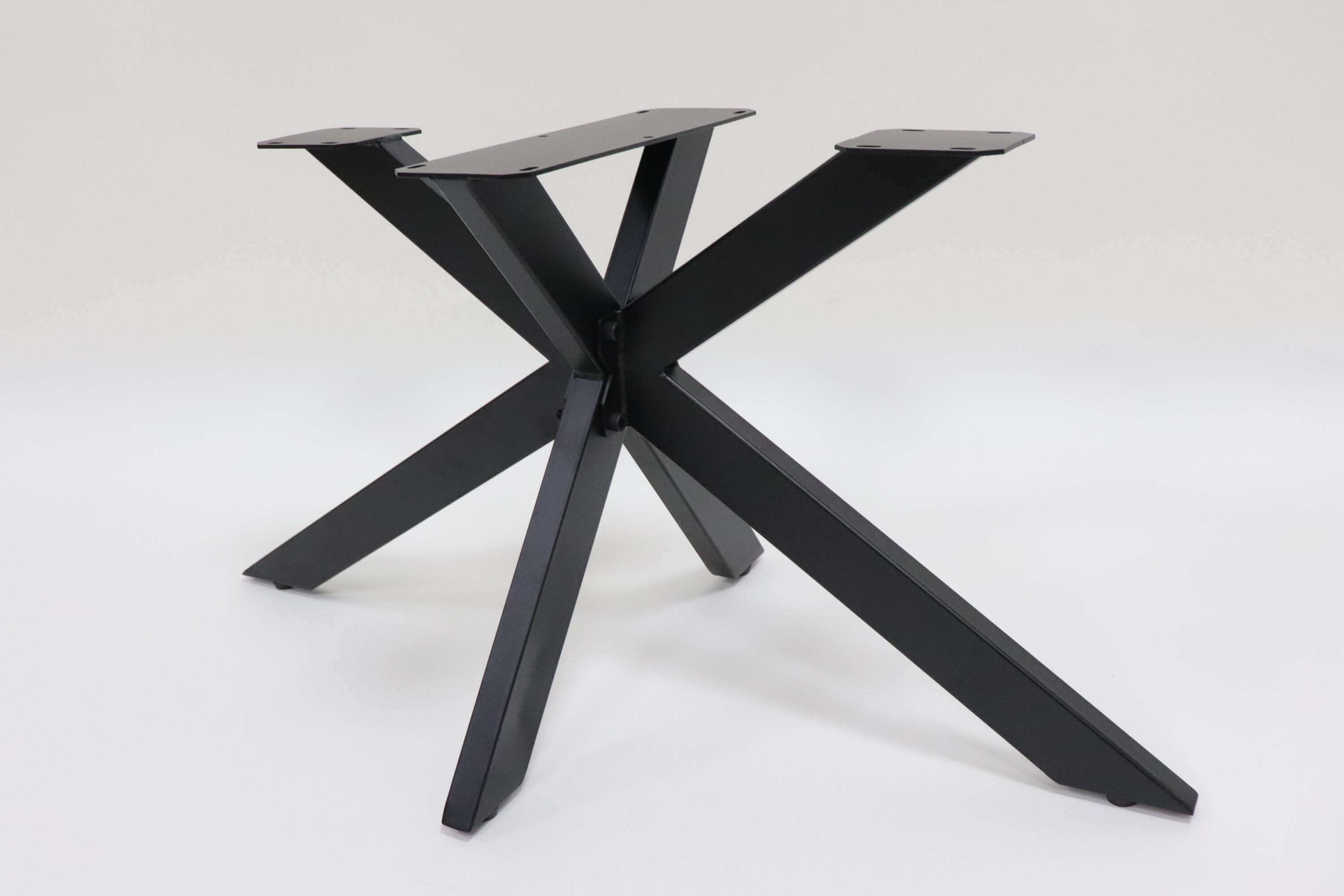 Black spider coffee table base with four angled arms and central hub