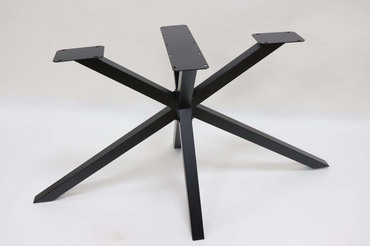 Spider dining table base with five angular legs and a rectangular top plate, dark metal