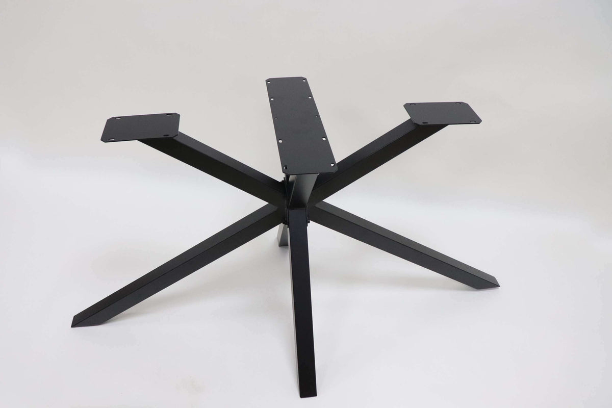 Spider dining table base with five dark legs, central junction, and mounting top plate.