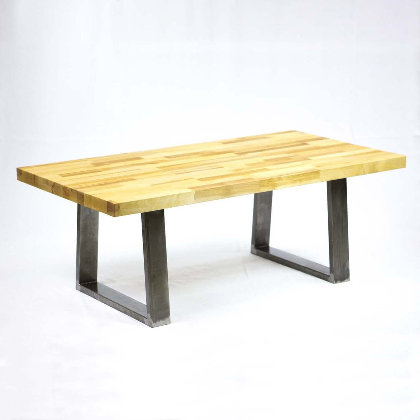 Set of black metal trapezoid coffee table legs with narrow tops