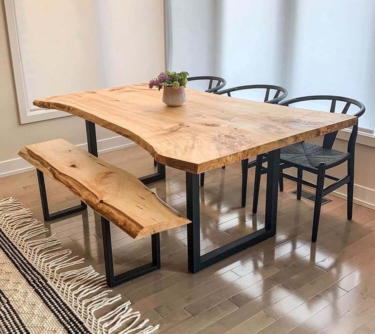 Dining table U legs set: black metal U-frame legs under a wooden tabletop.