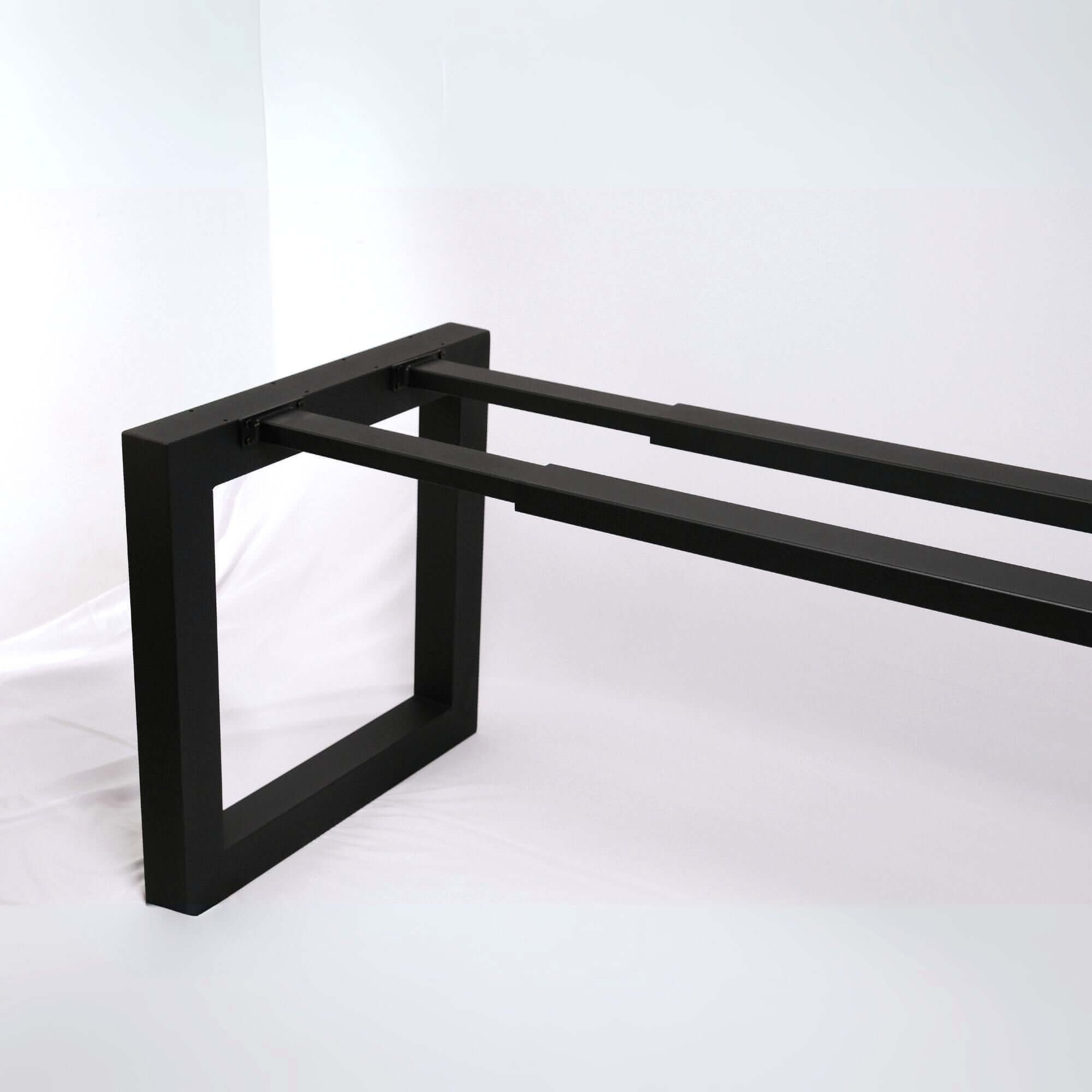 Detailed view of SS005 extendable square dining table frame featuring telescopic rails for extension.